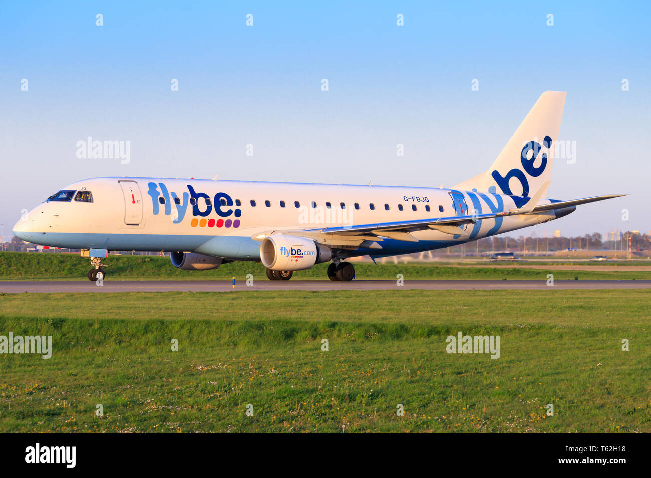 Amsterdam/Netherland Mai 01, 2019: Embraer from Flybe at Amsterdam Airport Stock Photo