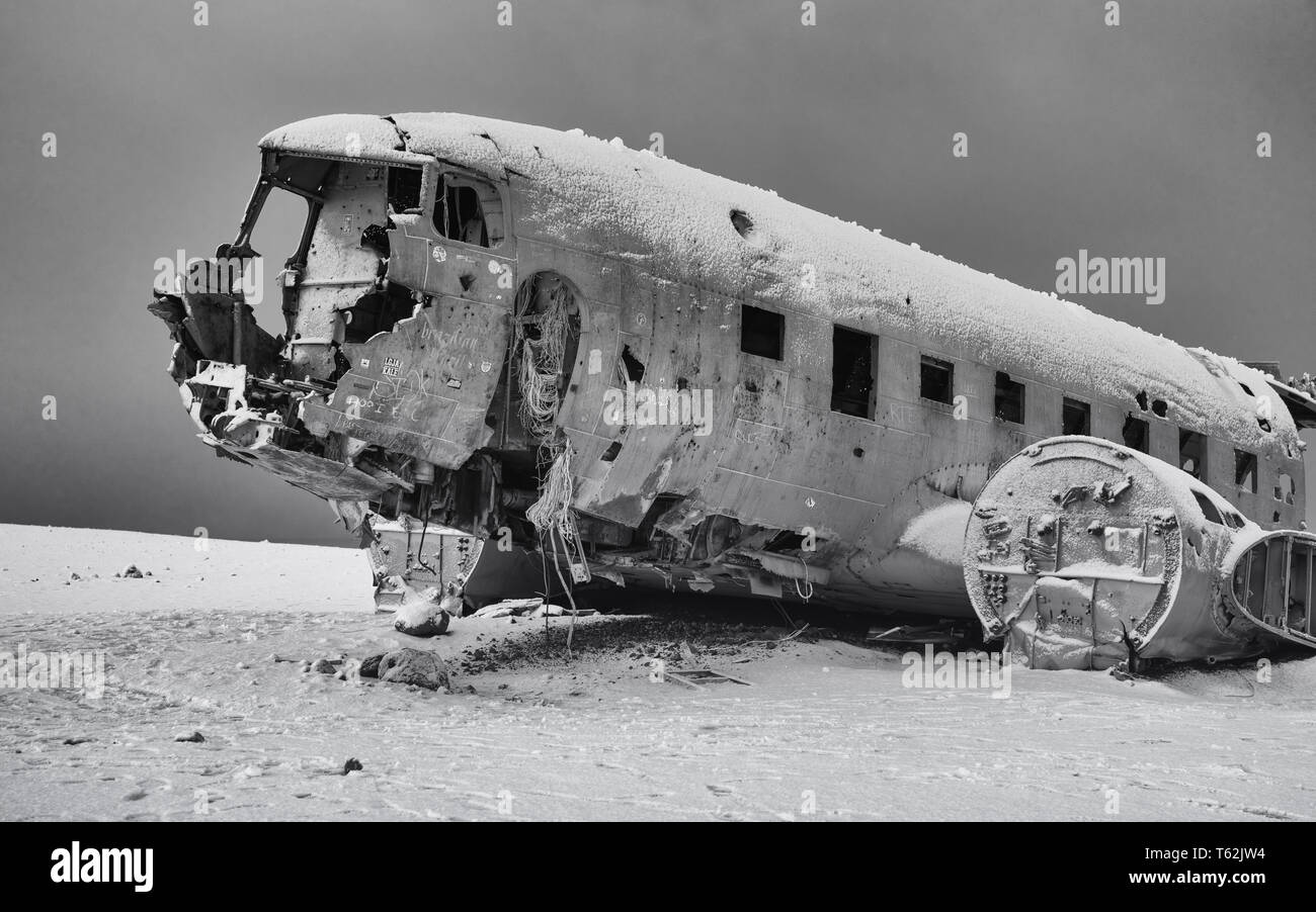 VIK, ICELAND - FEBRUARY 15, 2019: Wreck of the crashed DC 3 plane, covered by snow on a winter day on February 15, 2019 in Vik, Iceland Stock Photo