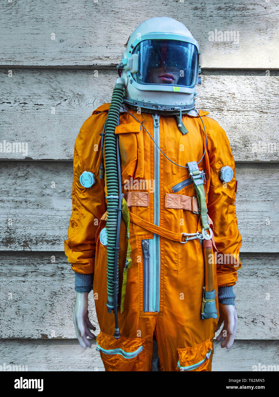 orange space suit worn by a mannequin Stock Photo: 244693265 - Alamy