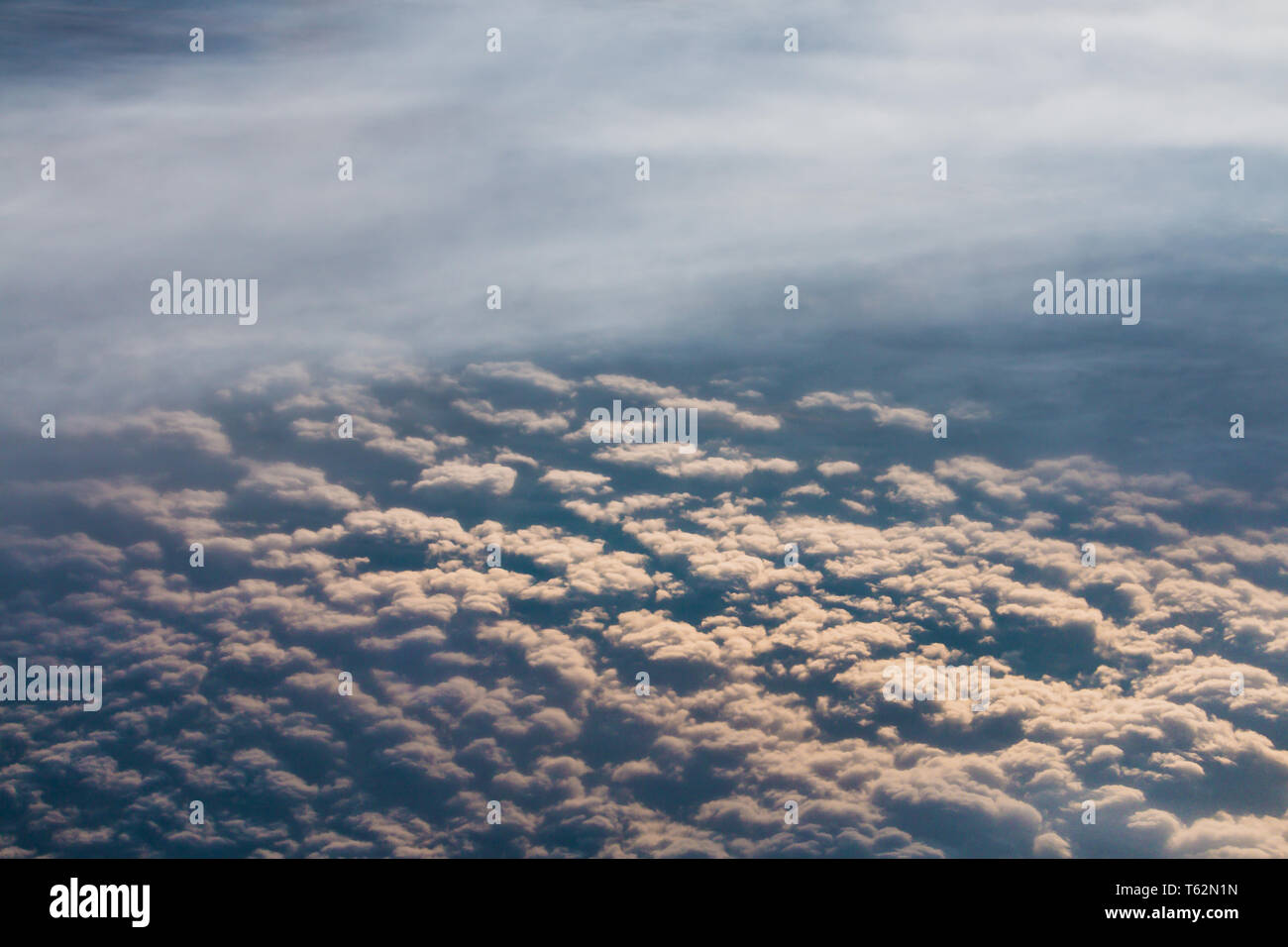 The lowest clouds in the atmosphere are stratus, cumulus, and stratocumulus. Stock Photo