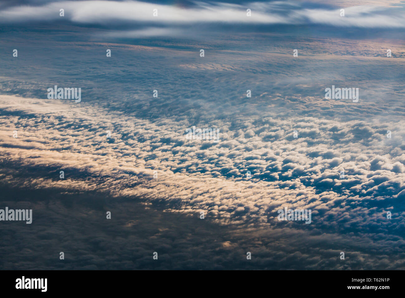 The lowest clouds in the atmosphere are stratus, cumulus, and stratocumulus. Stock Photo