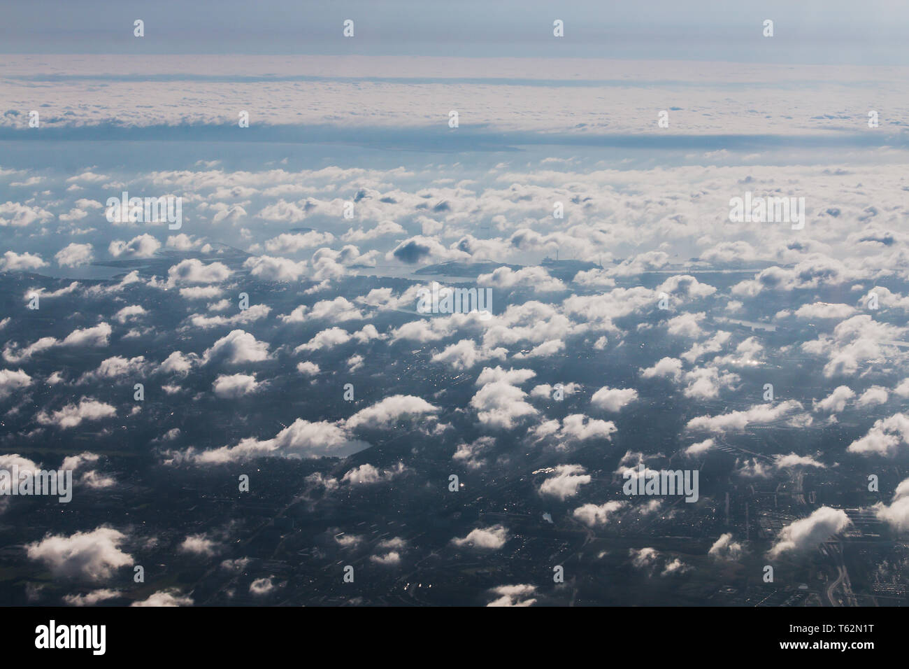 Mid - level clouds include altocumulus and altostratus Stock Photo