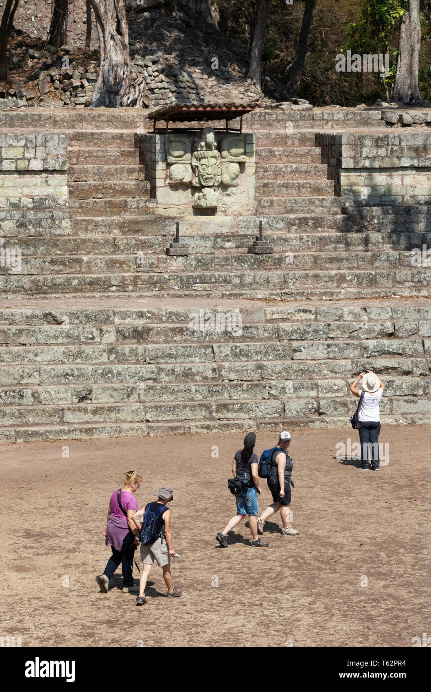 Copan Honduras travel - tourists looking at the ancient mayan ruins at Copan UNESCO World Heritage site, Copan Honduras Central America Stock Photo