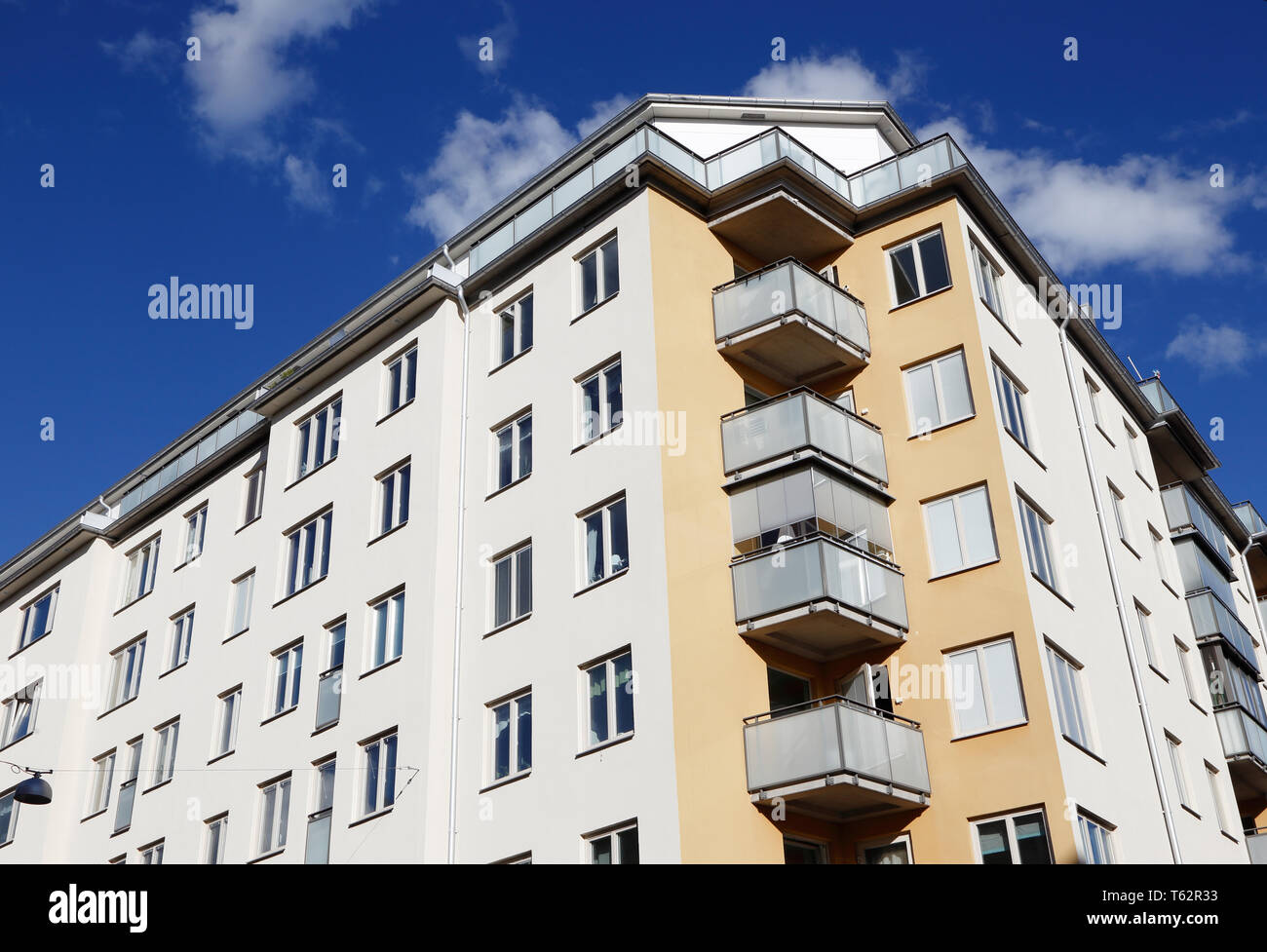 Low angel view of a multi story residential apartment building. Stock Photo