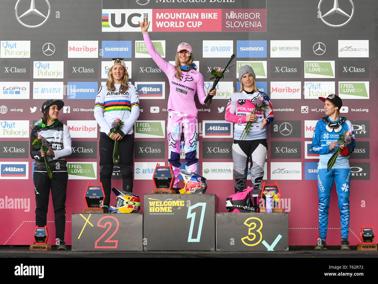 From left to right, fourth Marine Cabirou of France, second Rachel Atherton of Great Britain, first Tahnee Seagrave Great Britain, third Tracey Hannah and fifth Monika Hrastnik of Slovenia are seen on the podium after the UCI Mountain Bike World Cup Finals in Maribor. Stock Photo