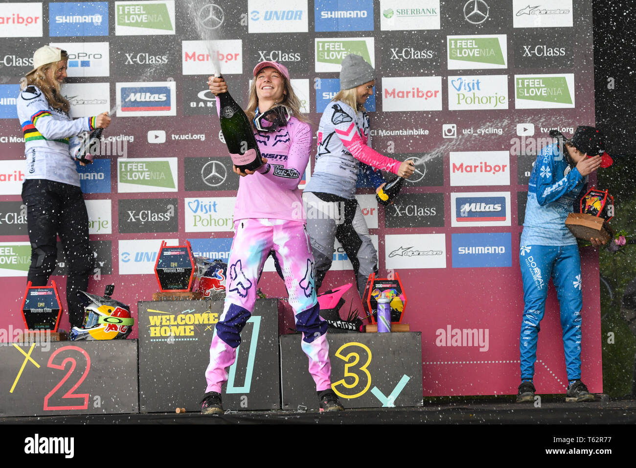 From left to right second Rachel Atherton of Great Britain, first Tahnee Seagrave Great Britain, third Tracey Hannah and fourth Monika Hrastnik of Slovenia are seen on the podium after the UCI Mountain Bike World Cup Finals in Maribor. Stock Photo