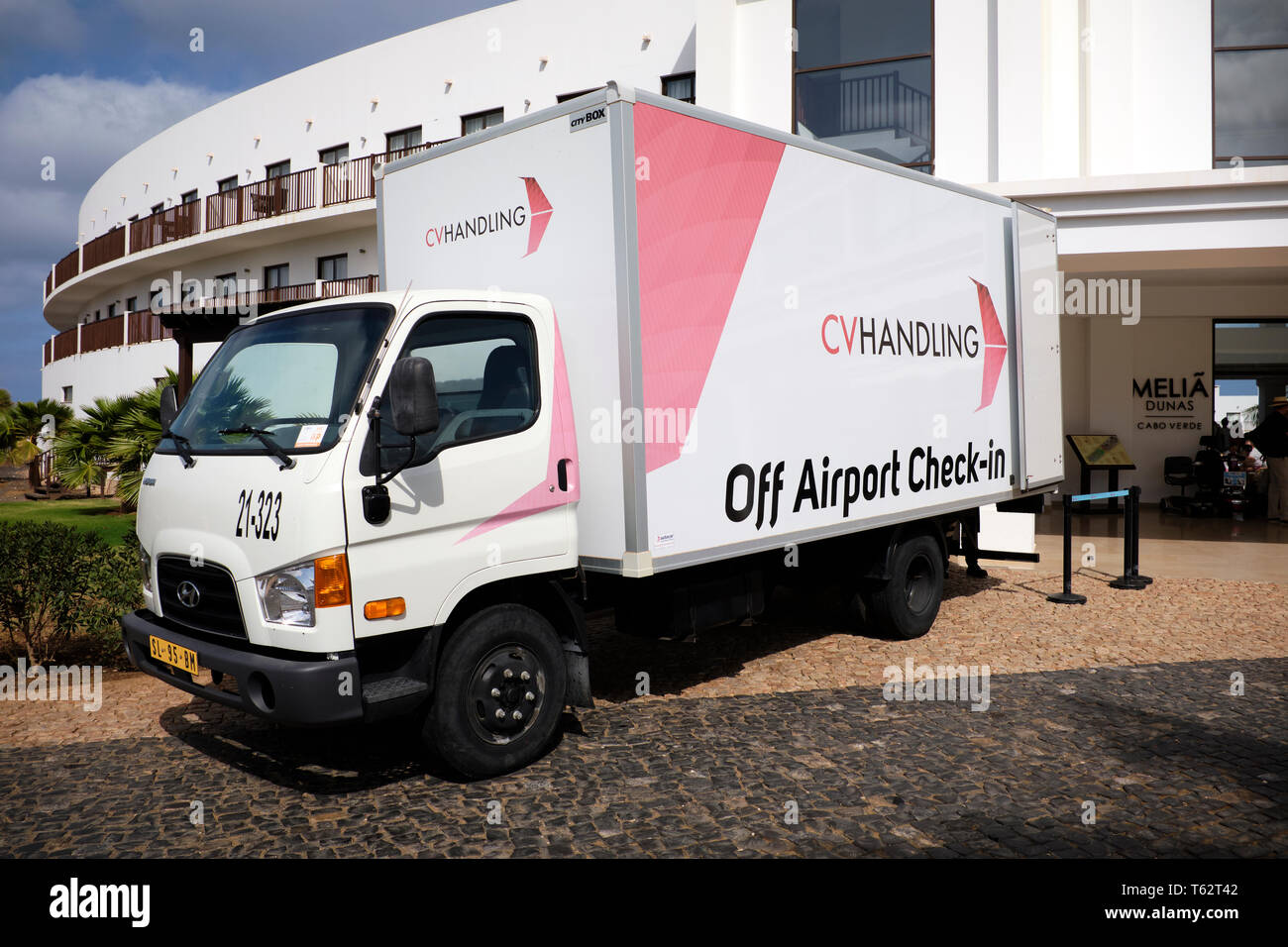 Off Airport Check-In Bonded Truck Taking Tourist Suitcases Direct From Hotel To The Airport, Melia Dunas Hotel, Sal Island, Cape Verde, Africa Stock Photo