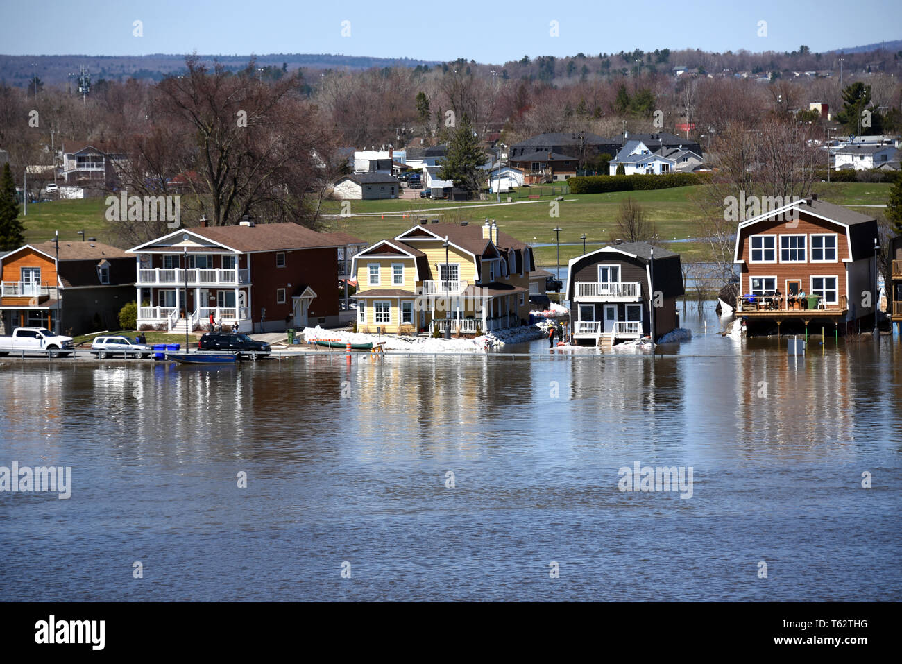 Gatineau, Canada - April 28, 2019:  The severe flooding on Rue Jaques-Cartier along the Quebec side of the swollen Ottawa River. Pointe Gatineau is on Stock Photo