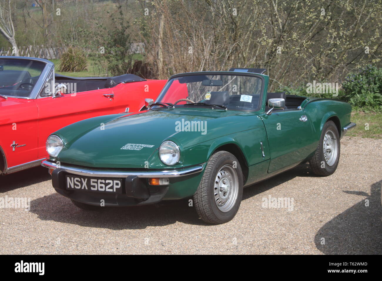 A GREEN TRIUMPH SPITFIRE OPEN TOP GREEN SPORTS CAR Stock Photo