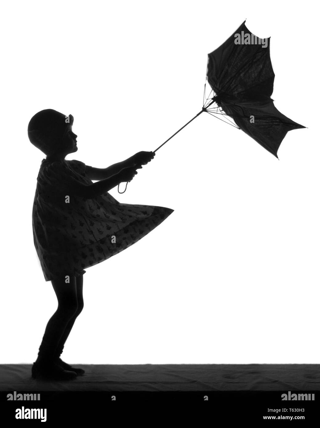 Child wind umbrella Black and White Stock Photos & Images Alamy