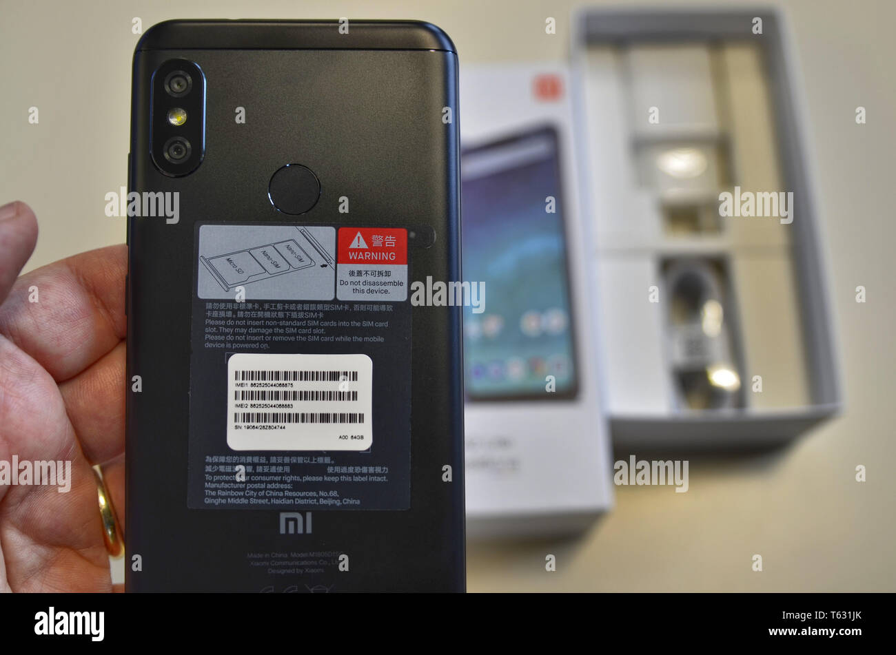 Turin, Piedmont, Italy. April 2019. An xiaomi A2 lite smartphone in its  original packaging. The box has been opened, close-up the back of the phone  wi Stock Photo - Alamy
