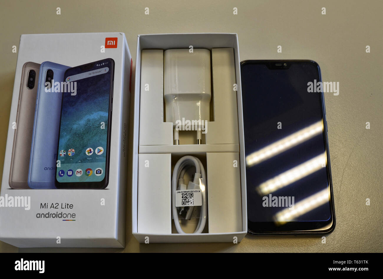 Turin, Piedmont, Italy. April 2019. An xiaomi A2 lite smartphone in its  original packaging. The box has been opened and its contents are visible  Stock Photo - Alamy