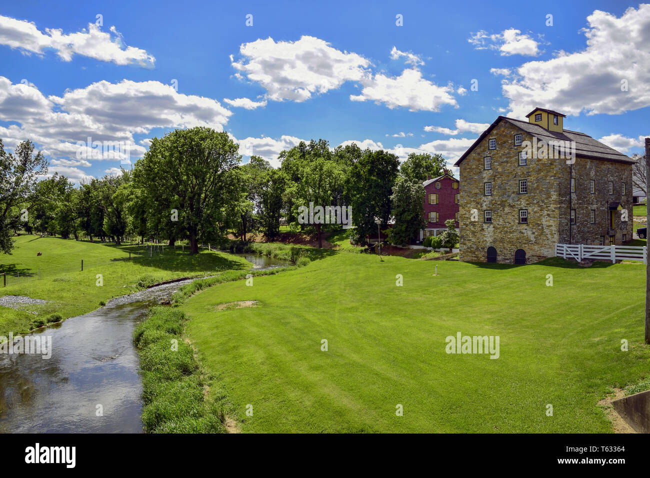 An Old River Grist Mill in Amish Country still Operational Stock Photo