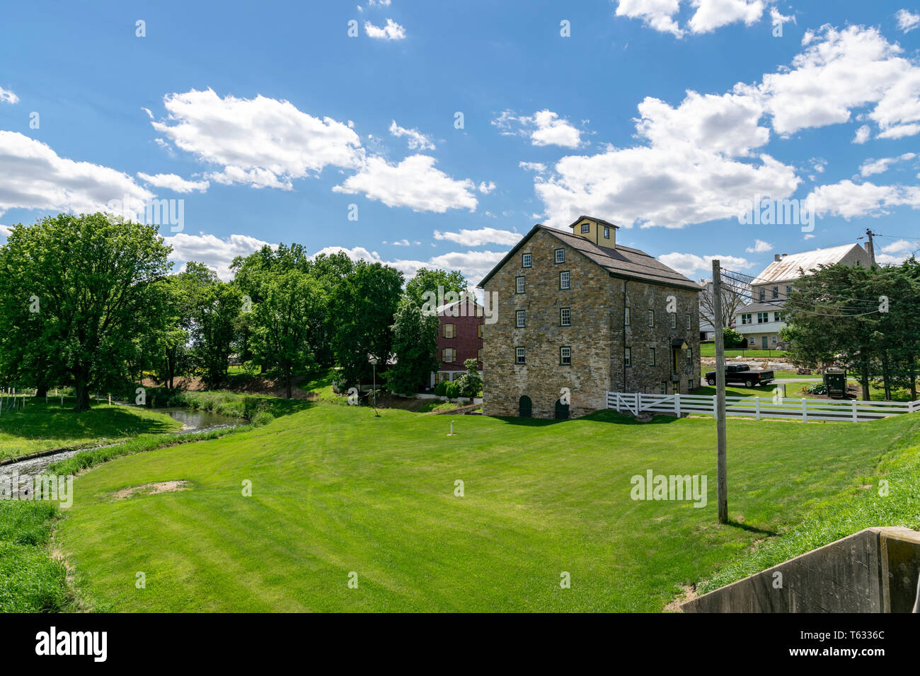 An Old River Grist Mill in Amish Country still Operational Stock Photo