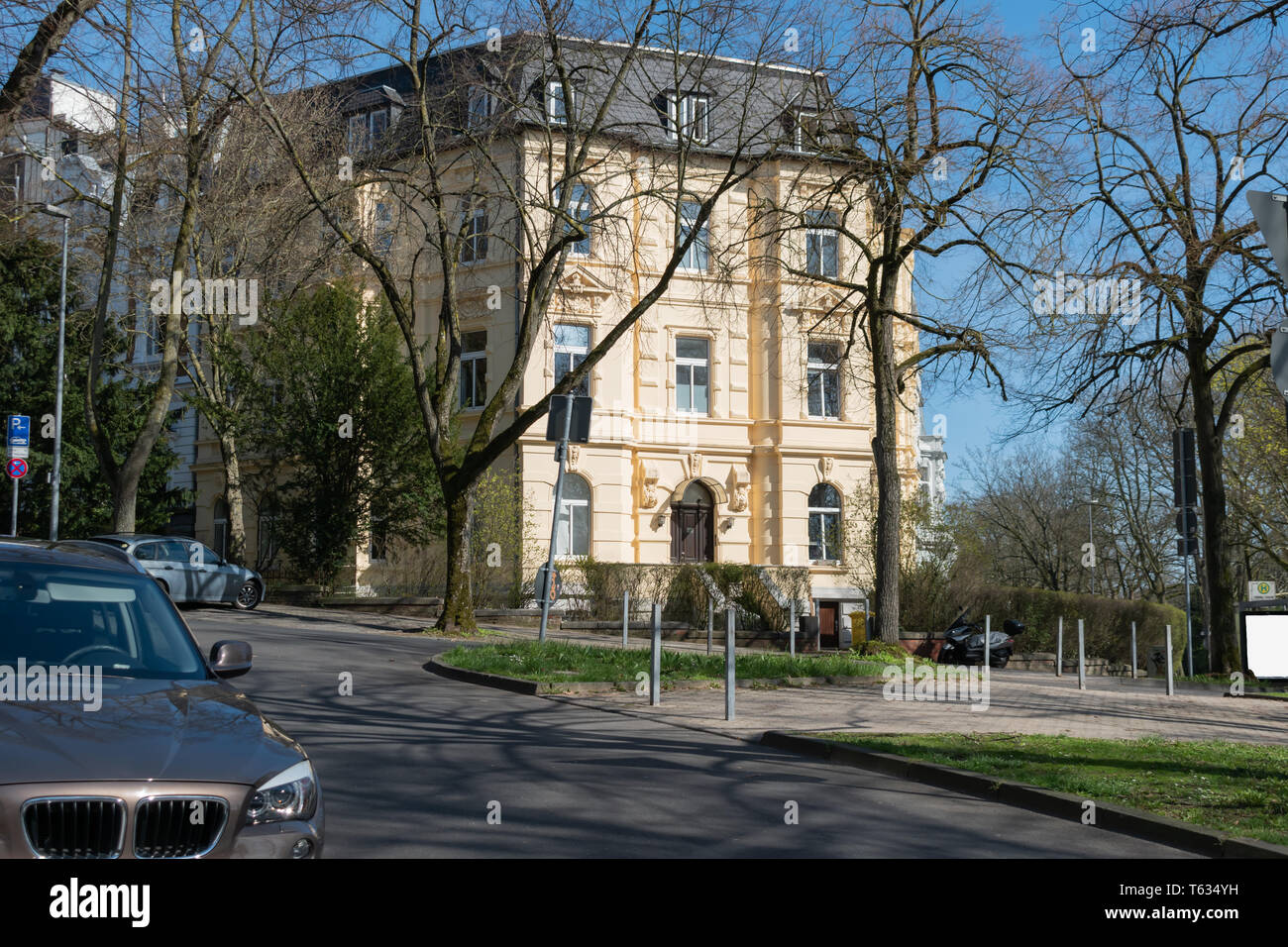 Whimsical and classical apartment building in Aachen, Germany. Sunny