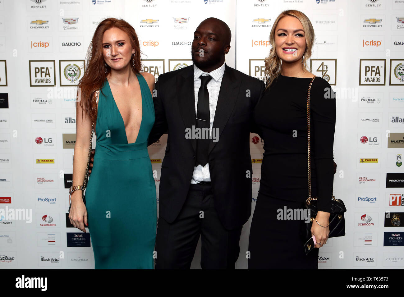 Adebayo Akinfenwa (centre) and Laura Woods (right) during the 2019 PFA