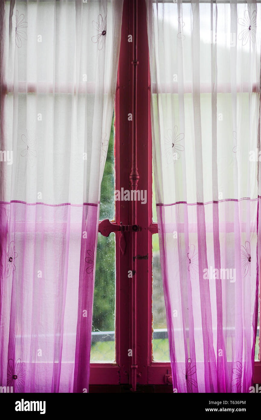 Pink window, cottage room, Chomerac, Ardeche, France Stock Photo