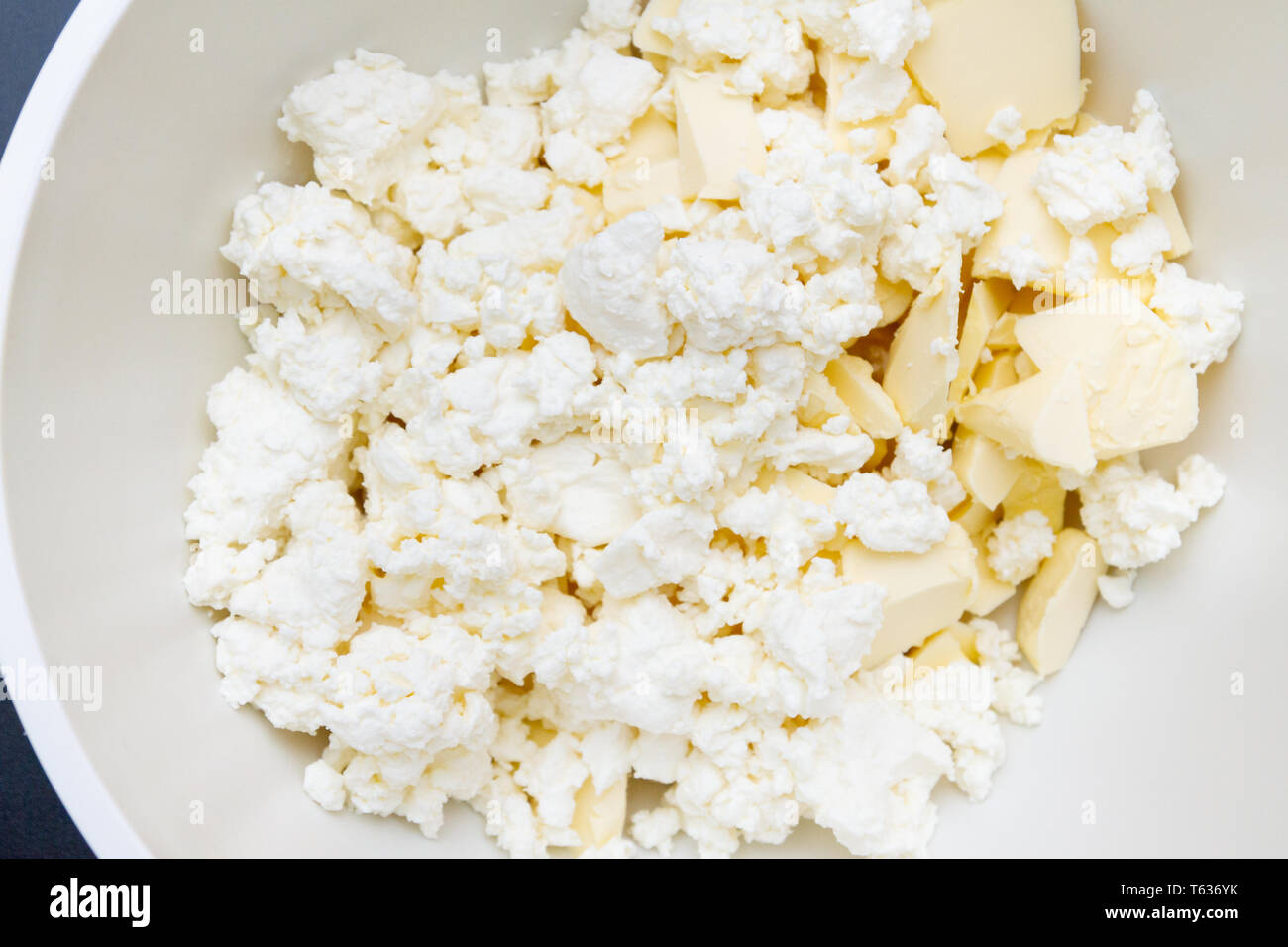In A Mixing Bowl Are The Ingredients Butter And Cottage Cheese For