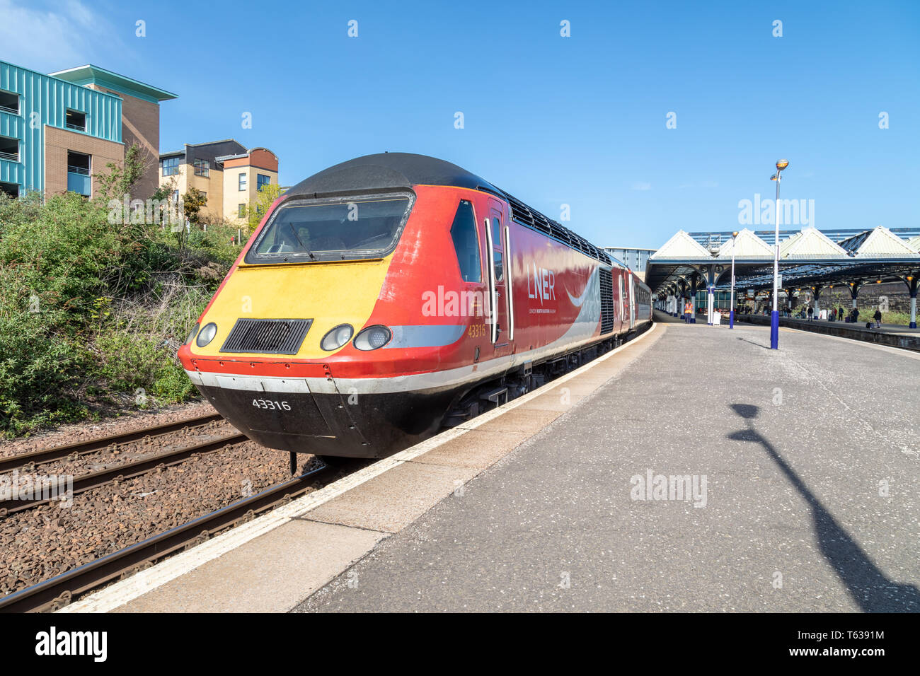 LNER Intercity 125 train at platform 4 of Dundee train station on 28th April 2019. The train soon left Dundee heading for Newcastle. Stock Photo