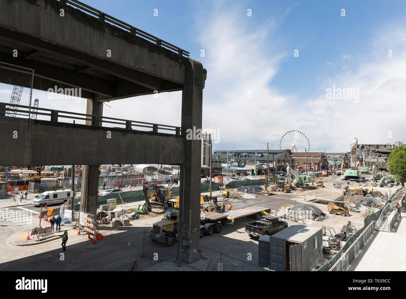 Seattle, Washington: Crews demolish the Alaskan Way Viaduct near the Seattle Ferry Terminal on the city’s central waterfront. A new two mile long bore Stock Photo