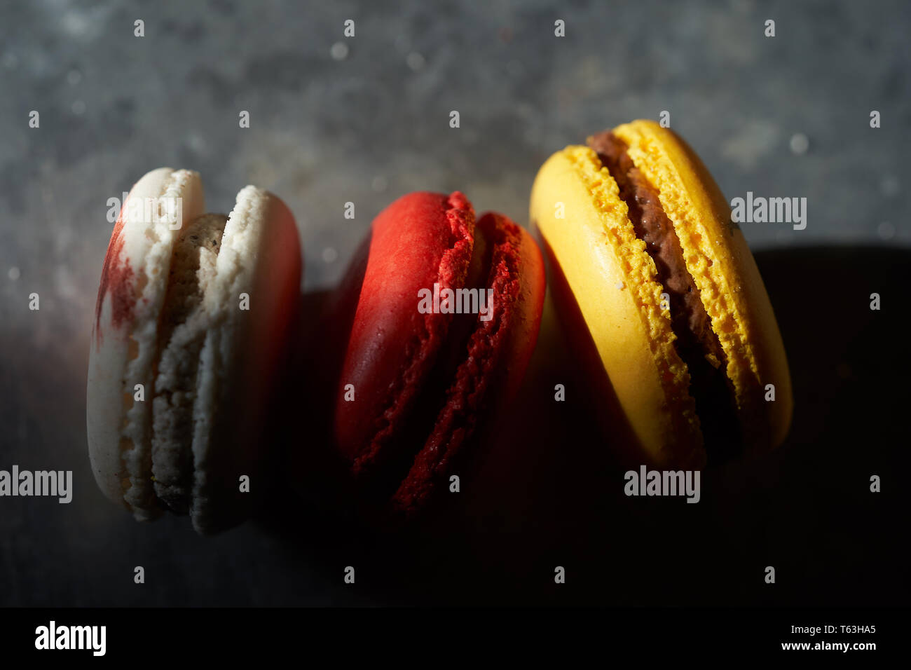 Macarons on a metallic background Stock Photo