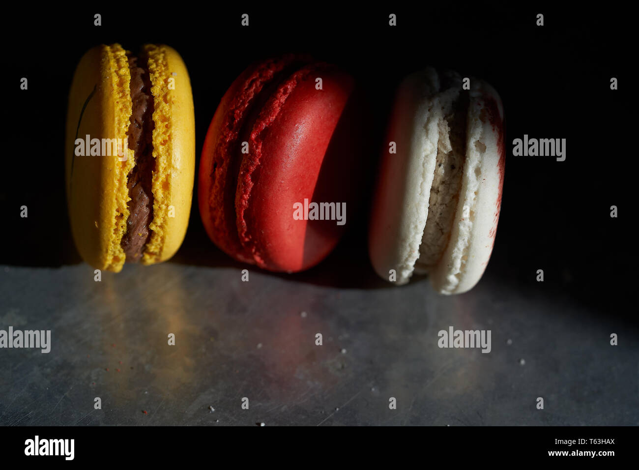 Macarons on a metallic background Stock Photo