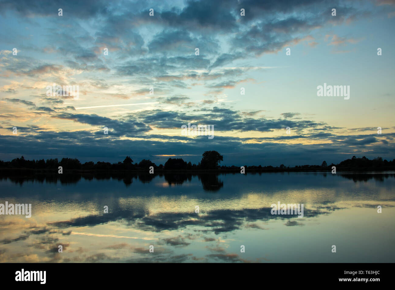 Sunset sky reflecting in water hi-res stock photography and images - Alamy