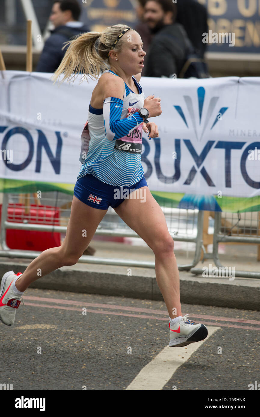 Charlotte Purdue running the 2019 London marathon. Purdue completed the race in 2  hours, 25 minutes and 38 second. Stock Photo