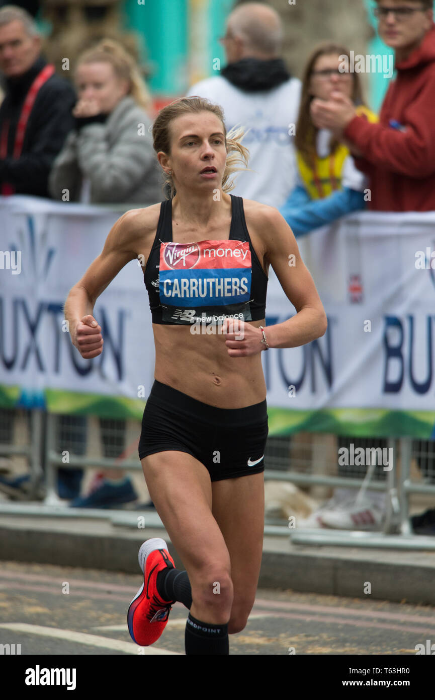 Hayley Carruthers running London marathon 2019. Near mile 25. Hayley finished in 18th. Stock Photo