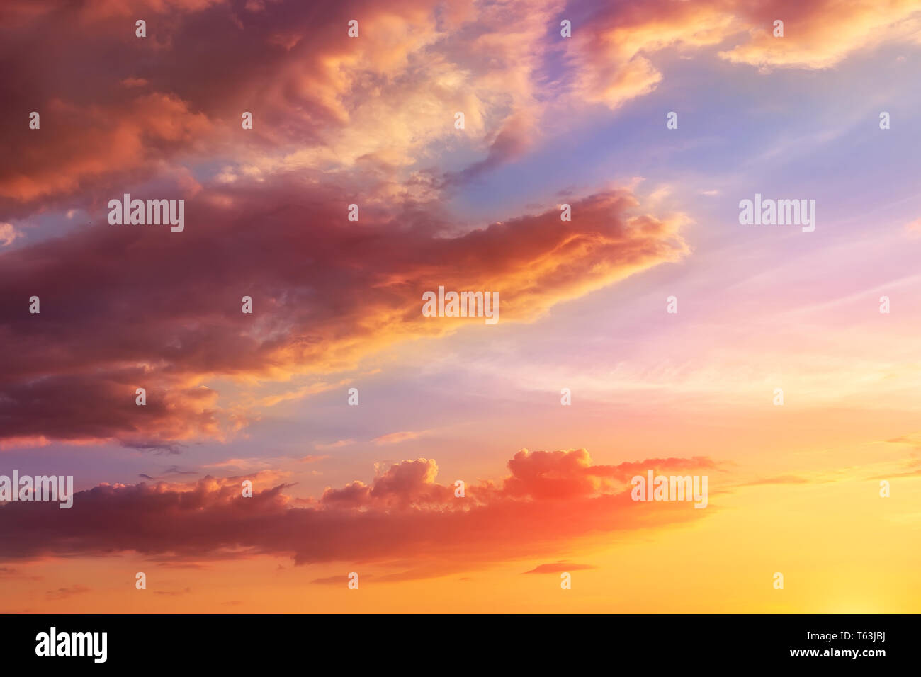 Natural sunset or sunrise with vibrant colors. Dramatic colorful sky  background Stock Photo - Alamy