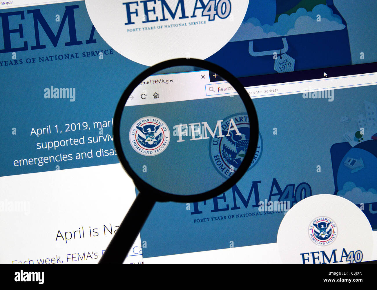 MONTREAL, CANADA - APRIL 24, 2019 : Fema.gov USA Government home page under magnifying glass. FEMA is The Federal Emergency Management Agency Stock Photo