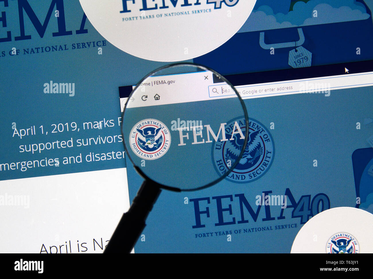 MONTREAL, CANADA - APRIL 24, 2019 : Fema.gov USA Government home page under magnifying glass. FEMA is The Federal Emergency Management Agency Stock Photo
