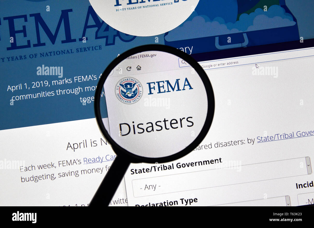 MONTREAL, CANADA - APRIL 24, 2019 : Fema.gov Disasters USA Government home page under magnifying glass. FEMA is The Federal Emergency Management Agenc Stock Photo