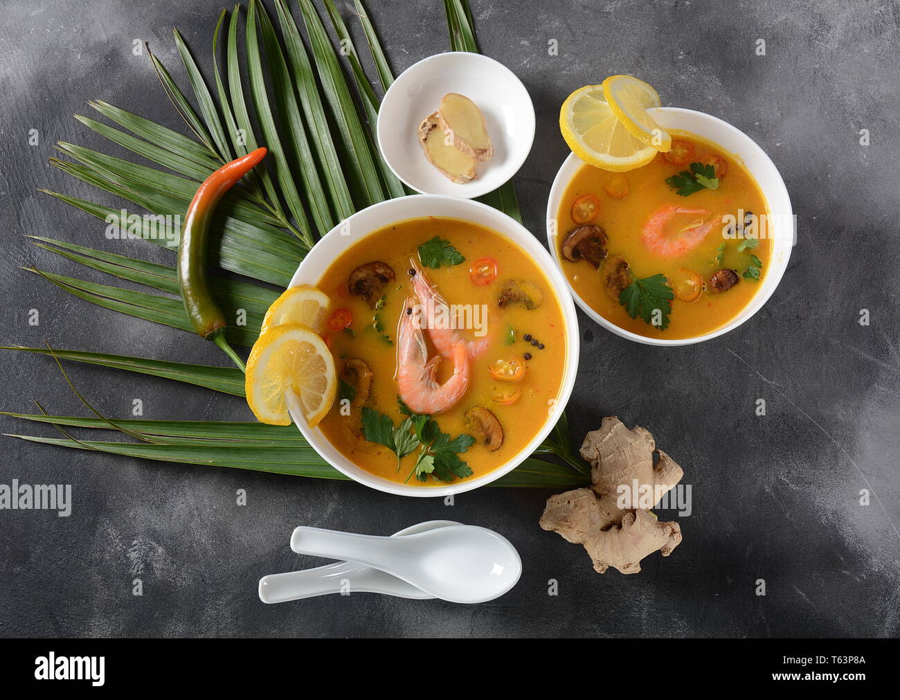 Tom Yum traditional spicy Thai soup with coconut milk, chili pepper