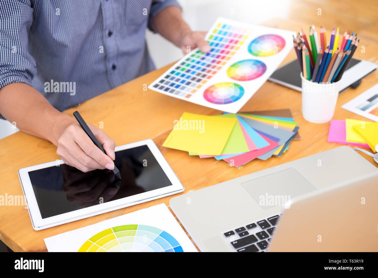 team interior designer drawing a new project using graphic computer and ...