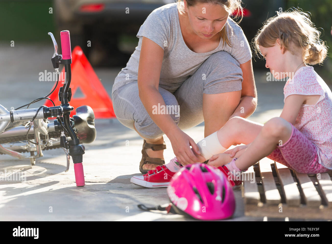 child after bicycle accident Stock Photo