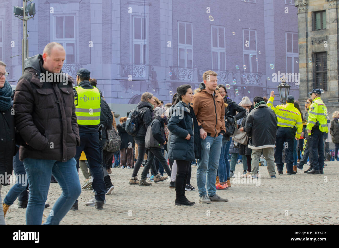 Police Men At Work At The Dam Square Amsterdam The Netherlands 2019 Stock Photo