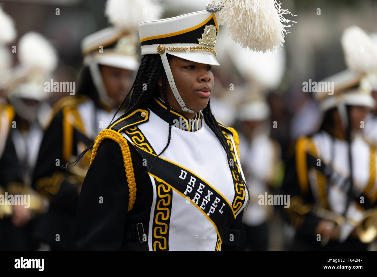 New Orleans, Louisiana, USA - February 23, 2019: Mardi Gras Parade, The Saint Katharine Drexel Preparatory School, The Yellow Jackets Marching band, p Stock Photo