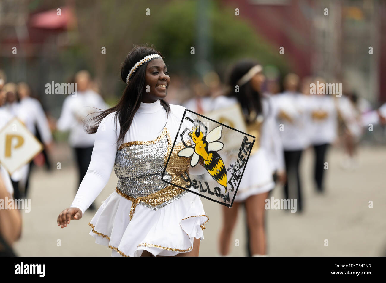 New Orleans, Louisiana, USA - February 23, 2019: Mardi Gras Parade, The Saint Katharine Drexel Preparatory School, The Yellow Jackets Marching band, p Stock Photo