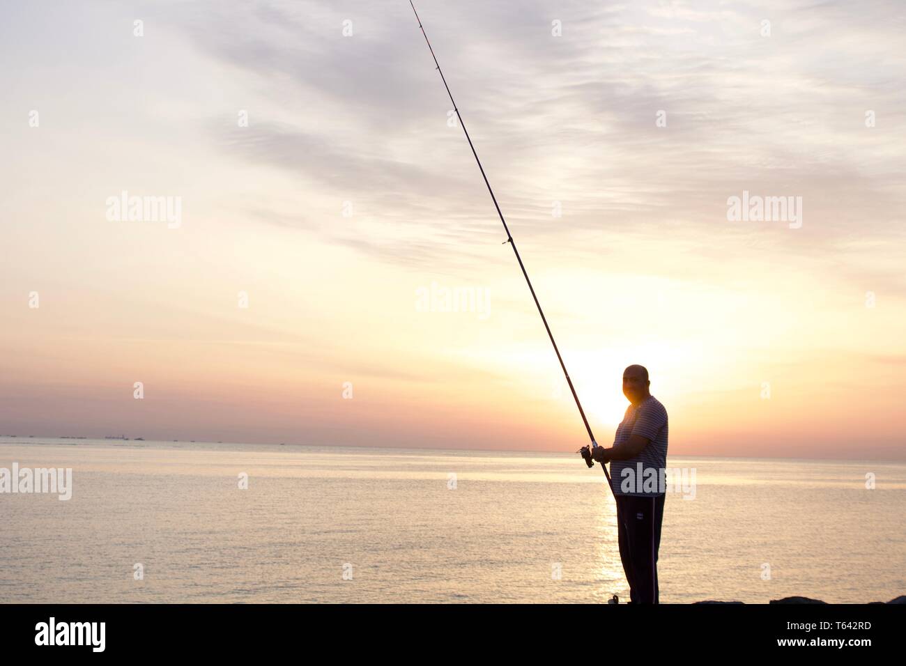 fishing at the seaside of kuwait Stock Photo Alamy