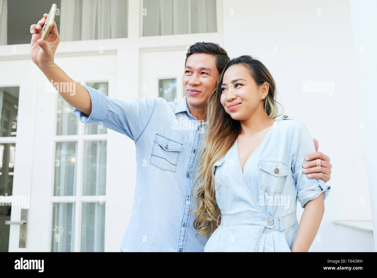 Happy couple taking selfie Stock Photo