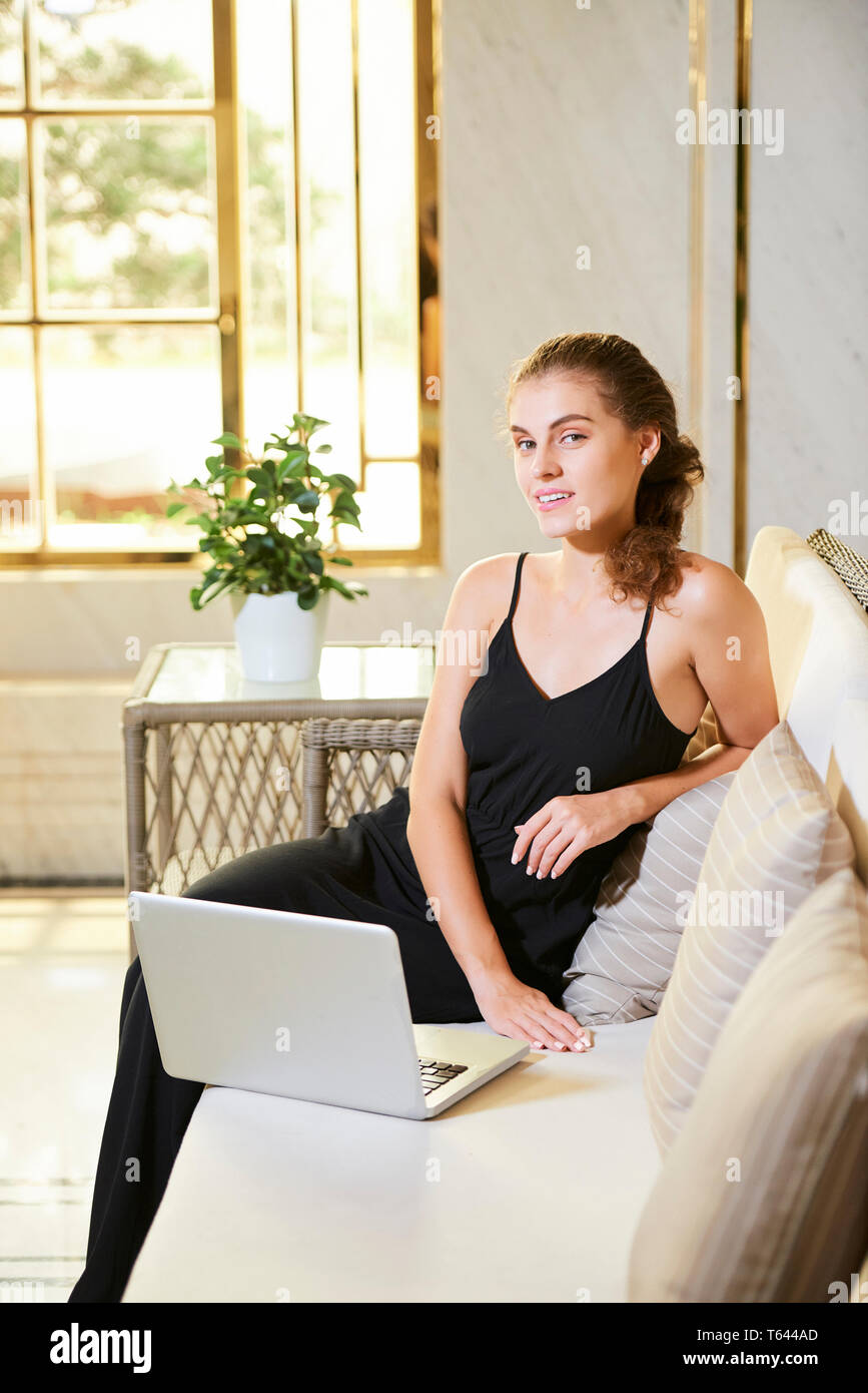 Portrait smiling pretty woman at home Stock Photo