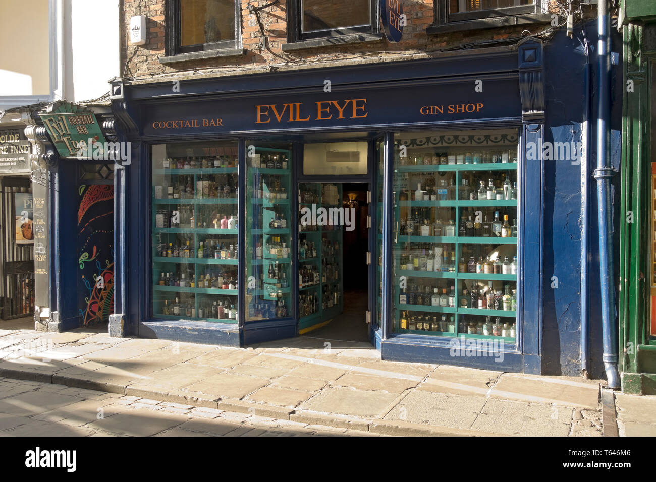 Evil Eye gin shop store and cocktail bar in the town city centre Stonegate York North Yorkshire England UK United Kingdom GB Great Britain Stock Photo
