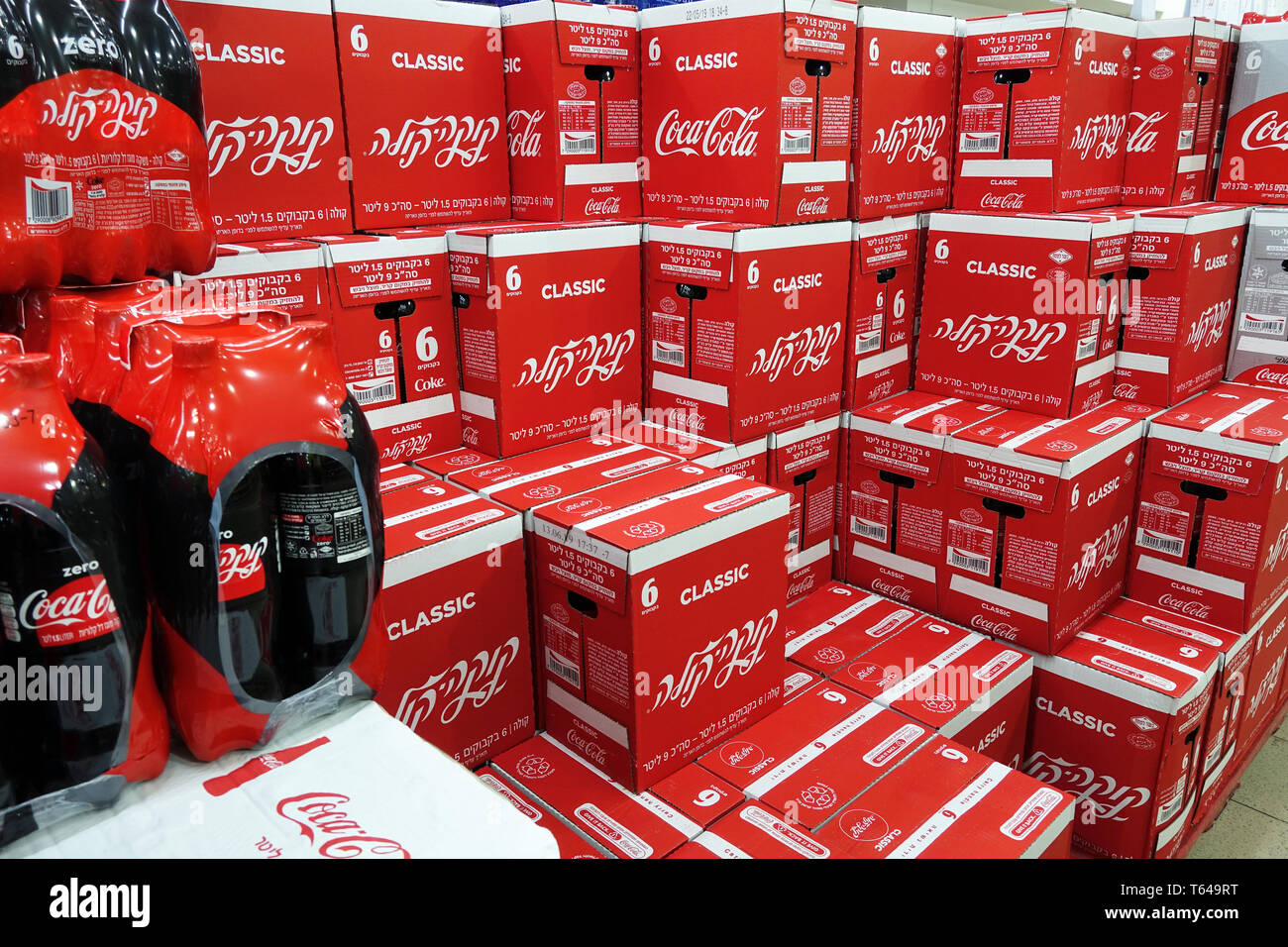 Stack of Coca-Cola boxes in a store Stock Photo - Alamy