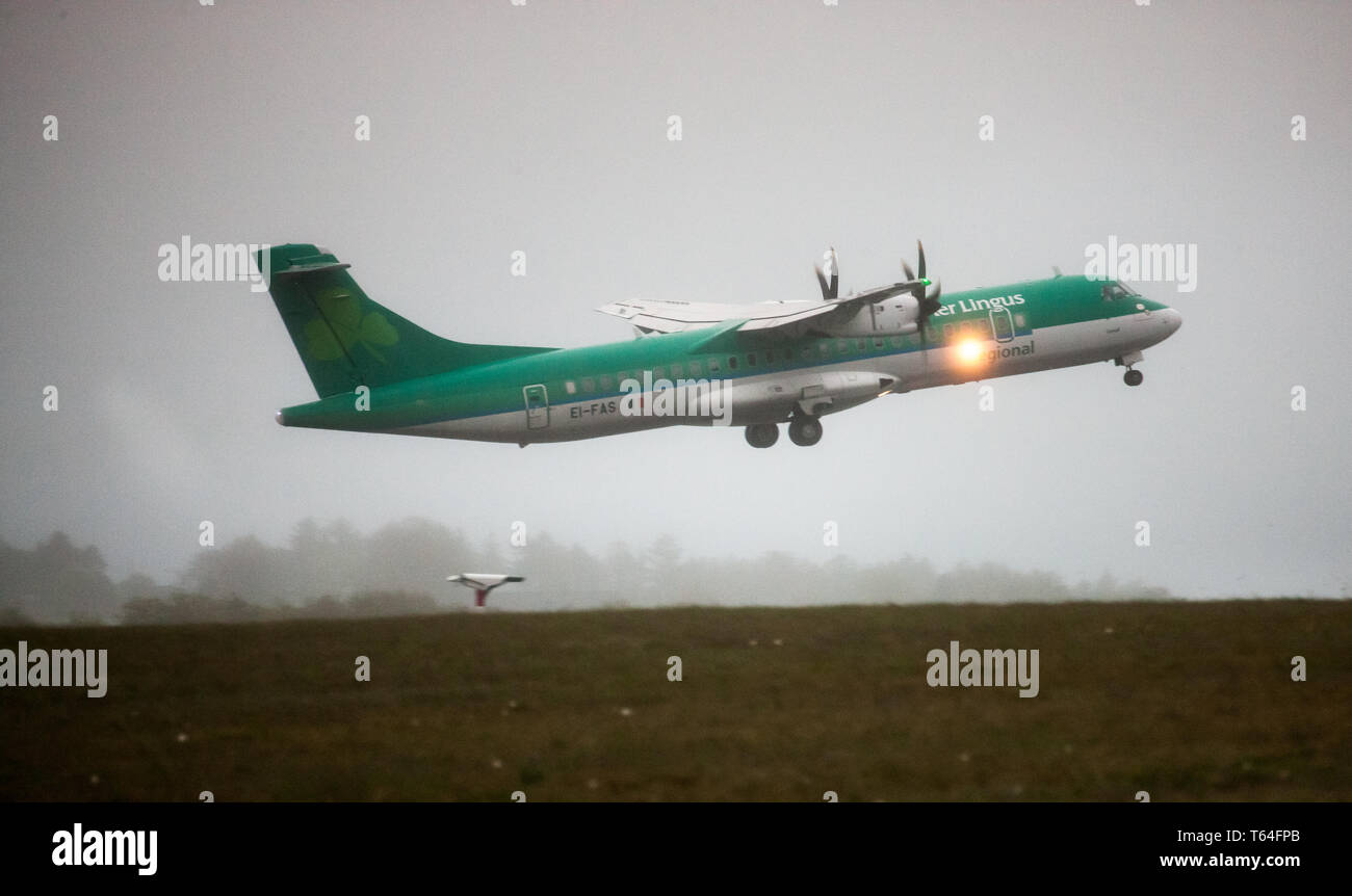 Cork Airport, Cork, Ireland. 29th Apr, 2019. An Aer Lingus Regional ATR 72 aircraft operated by Stobart Air takes off for Edinburgh from runway 16-34 on a very foggy morning at Cork Airport, Cork, Ireland. Credit: David Creedon/Alamy Live News Stock Photo
