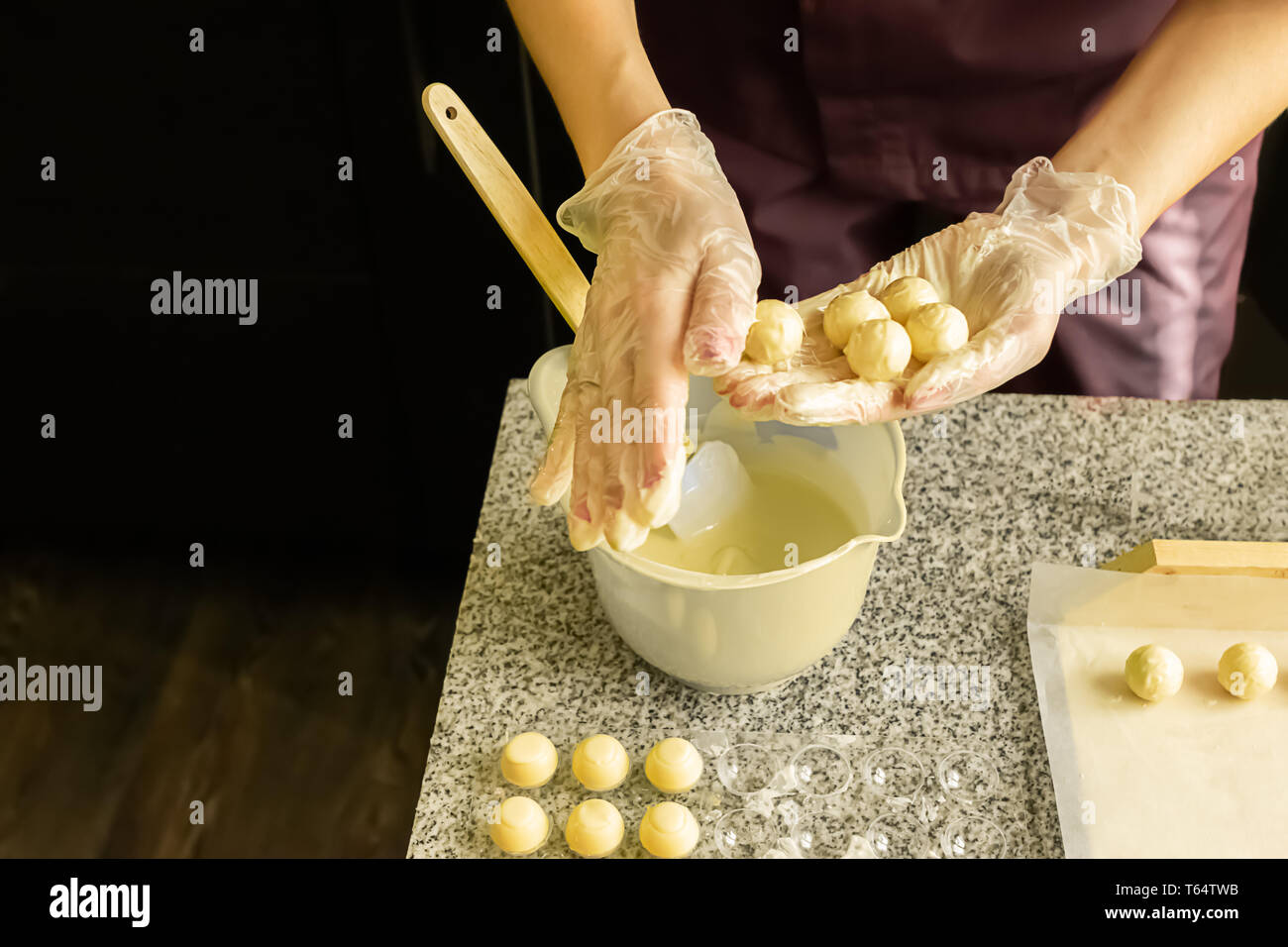 The Process Of Making Handmade Chocolates. Round Chocolate Candies In ...