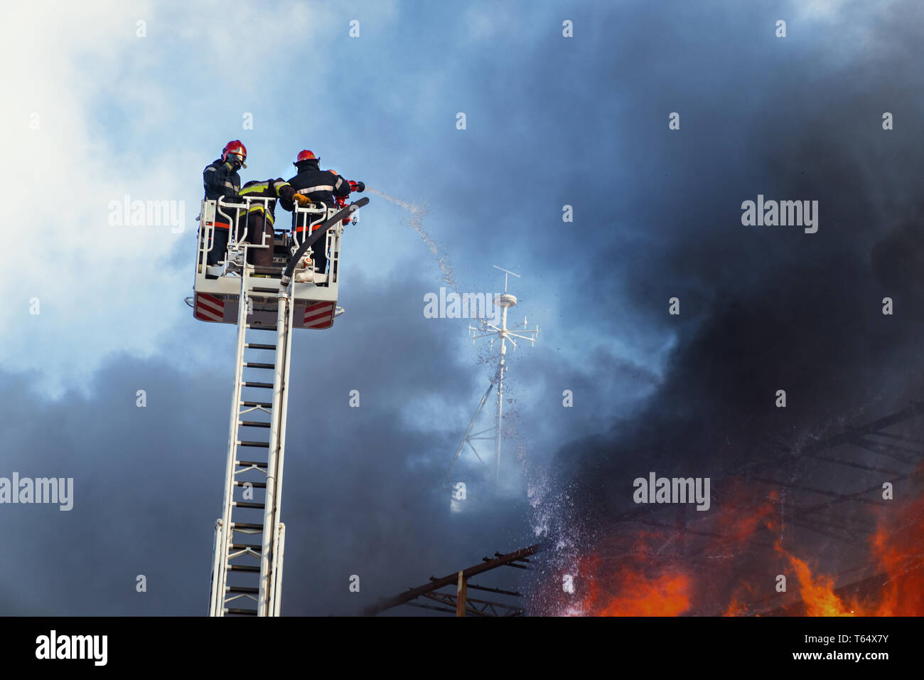Firefighters extinguish a big fire Stock Photo