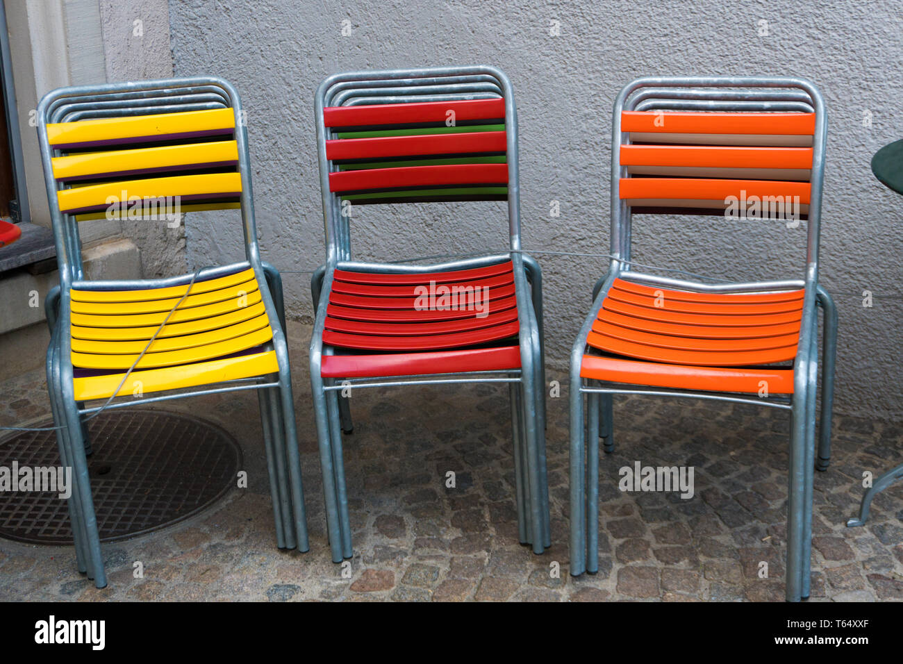 Colorful metal chairs hi-res stock photography and images - Alamy