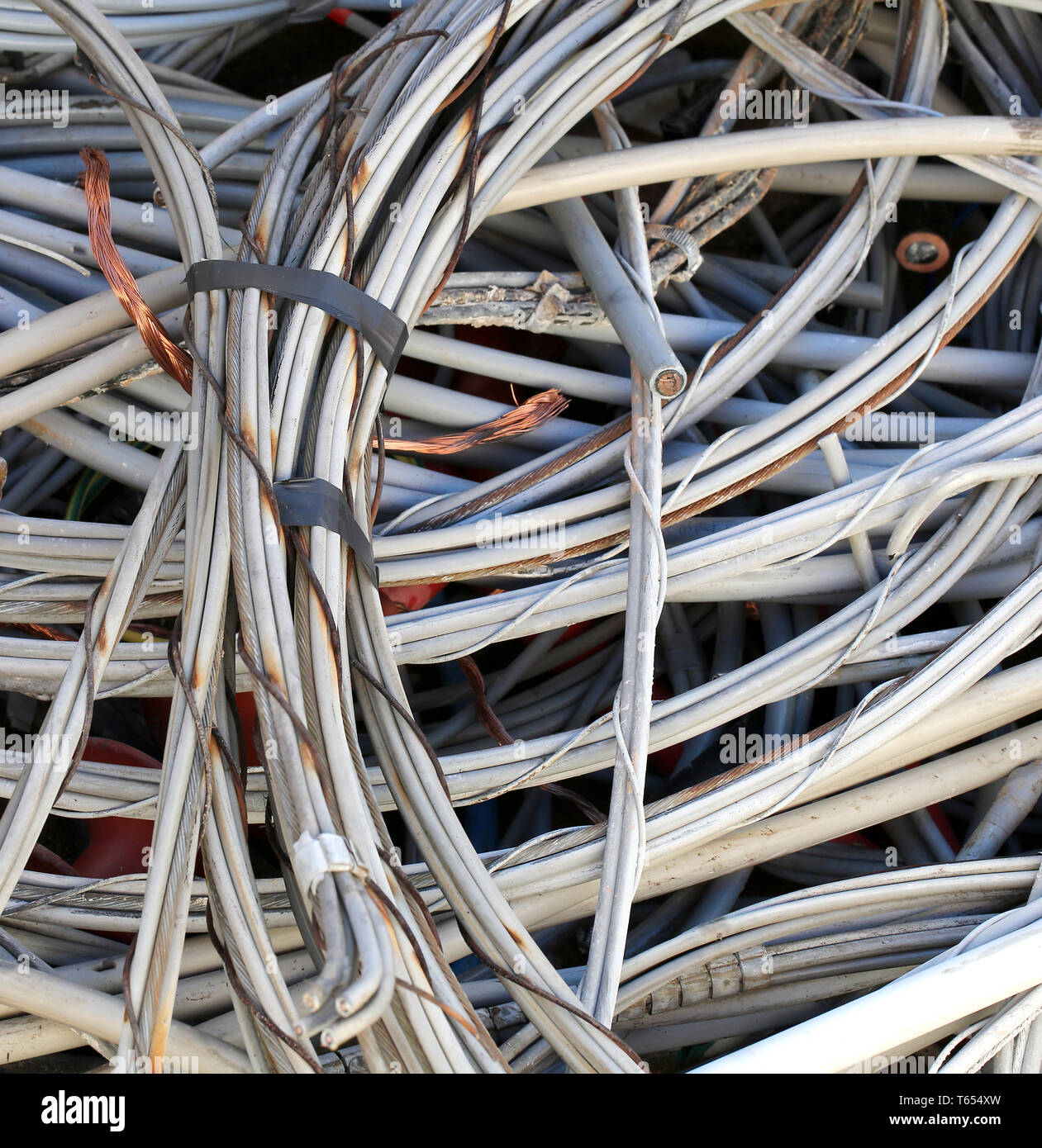 electrical copper cables in a recyclable material landfill Stock Photo