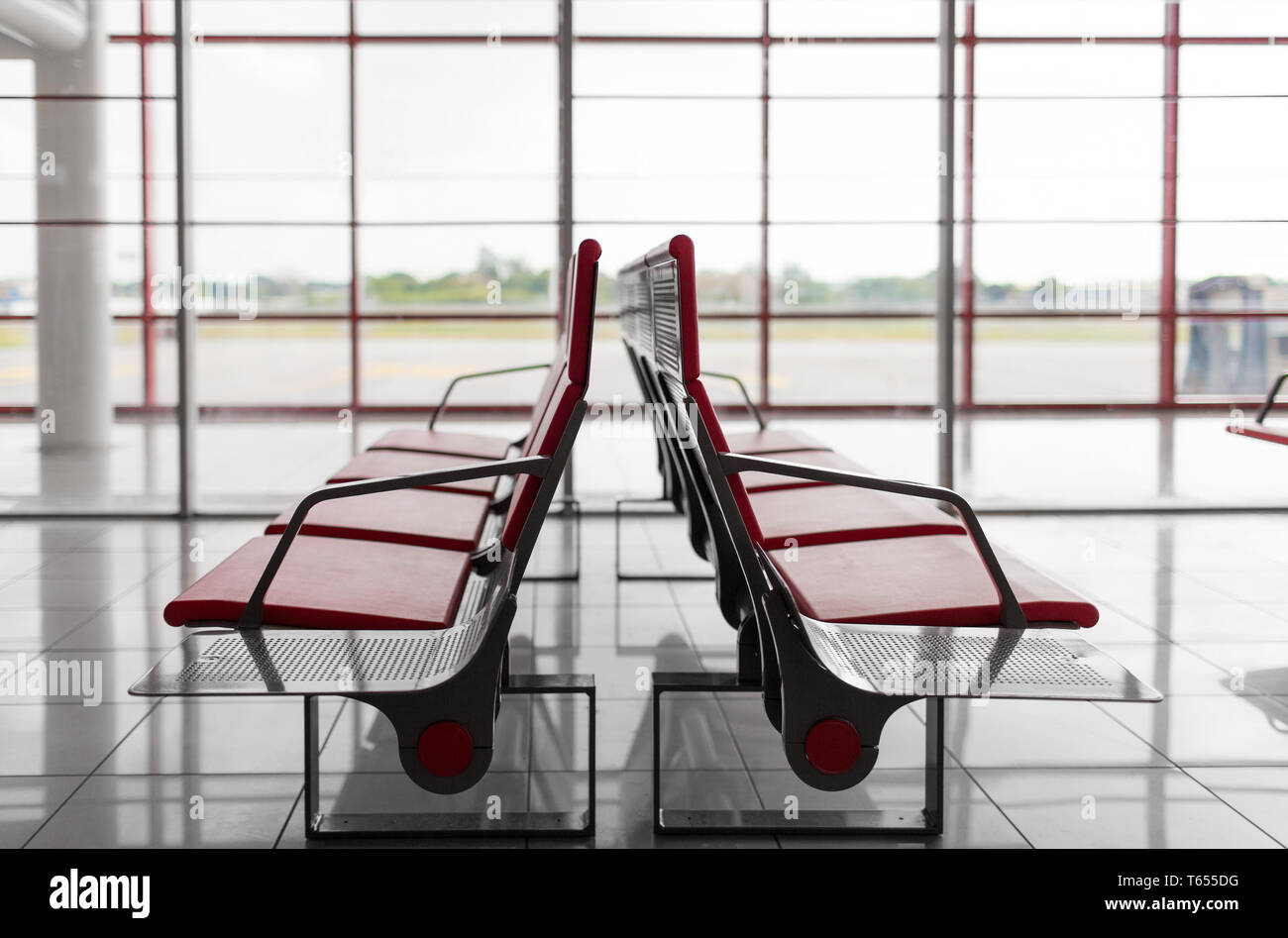 empty seats at airport terminal Stock Photo